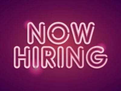 Now Hiring in Pink neon writing